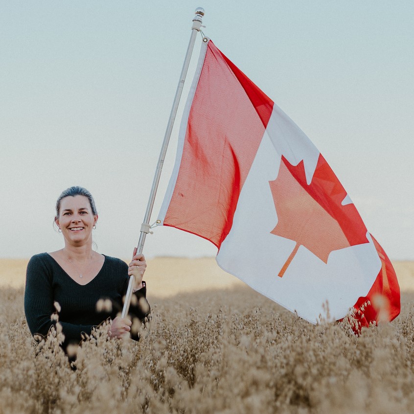 Shawna with flag in oat sq